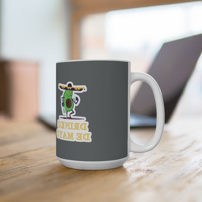 Gray mug with a colorful design on a wooden surface
