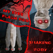 Mummy-like figure with red glowing eyes and text on a dark background