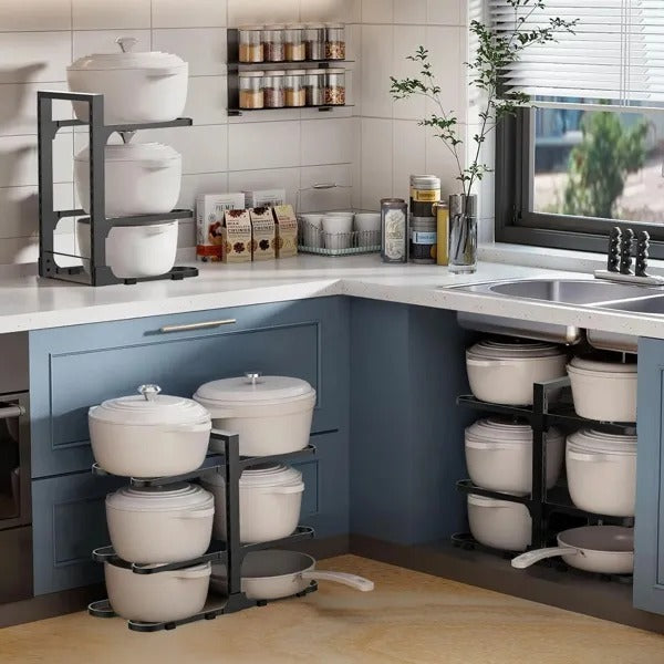 Kitchen with pots and pans on shelves and a window view