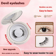 Devil eyelashes packaging with an open case on a pink background