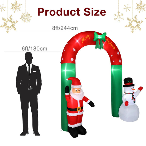 Inflatable Christmas arch with Santa and snowman, shown with a person for scale.