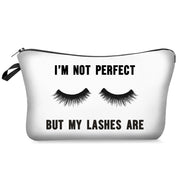 White pouch with black text and eyelash graphics on a white background