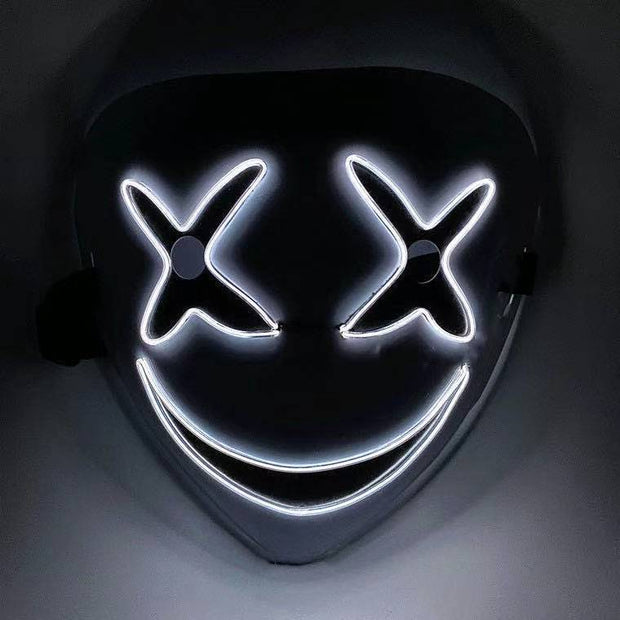 Mask with glowing white LED lights on a dark background