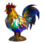 Colorful stained glass rooster lamp on a white background