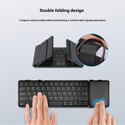 Foldable keyboard with a double folding design on a light gray background