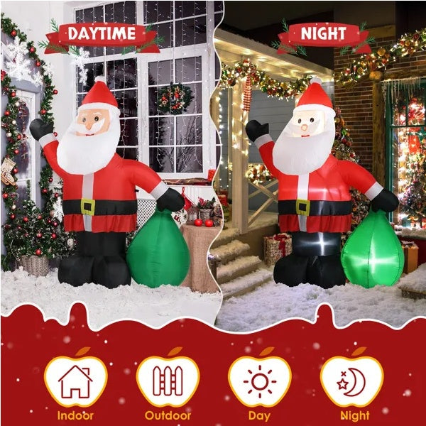 Inflatable Santa Claus with a green sack at daytime and nighttime, with a house decorated for Christmas in the background.