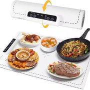Electric warming tray section has light background