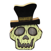 Skull-shaped object with a top hat on a white background