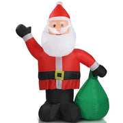 Inflatable Santa Claus figure with a green sack on a white background