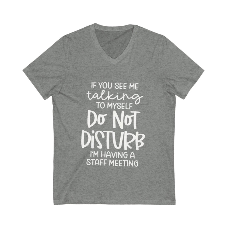 Gray t-shirt with white text on a white background