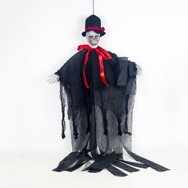 Halloween decoration of a ghostly figure with a black top hat and red ribbon on a white background
