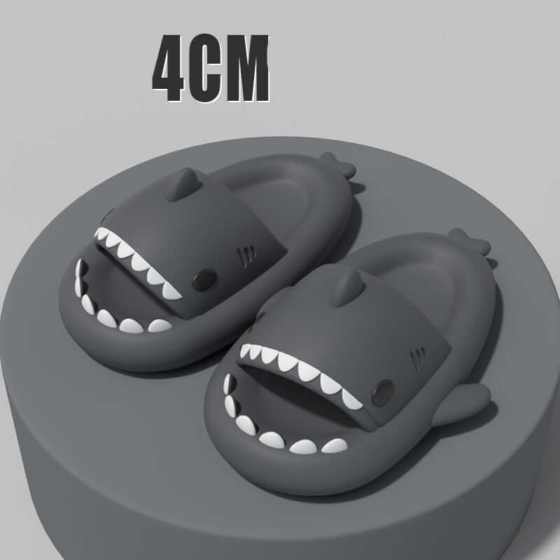 Sharky slippers featuring a cute cartoon shark design, measuring 4cm, on a circular display.