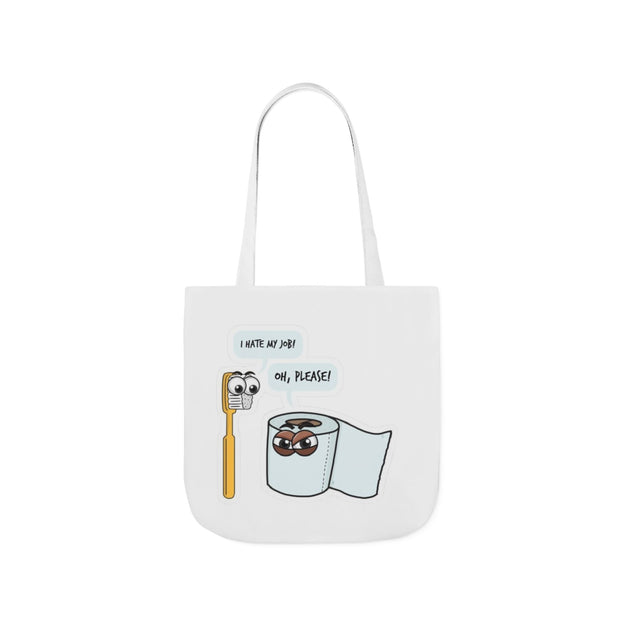 White tote bag with cartoon designs of a toothbrush and toilet paper roll on a white background