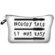White pouch with black text and mascara illustrations on a white background