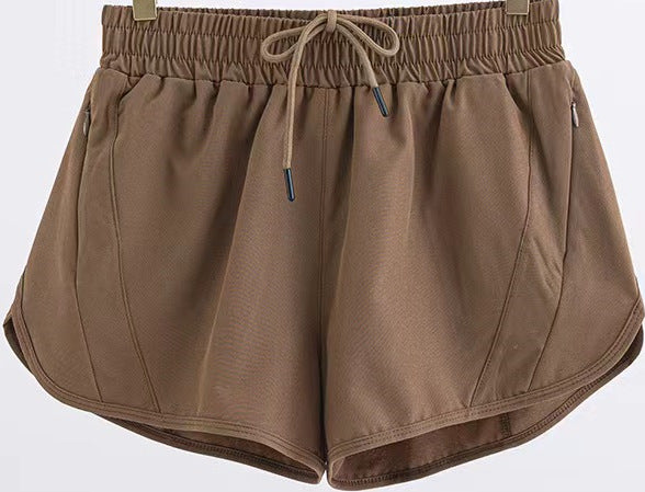 Summer Adventure Shorts: Breathable, Loose Fit with Zipper Pockets for Confident Outdoor Runs & Fitness Fun!