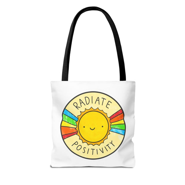 Tote bag with a sun design and 'Radiate Positivity' text on a white background