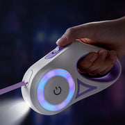 Hand holding a futuristic device with glowing elements against a dark background
