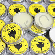 Multiple containers of Oaken Beard Balm with yellow labels and silver lids.