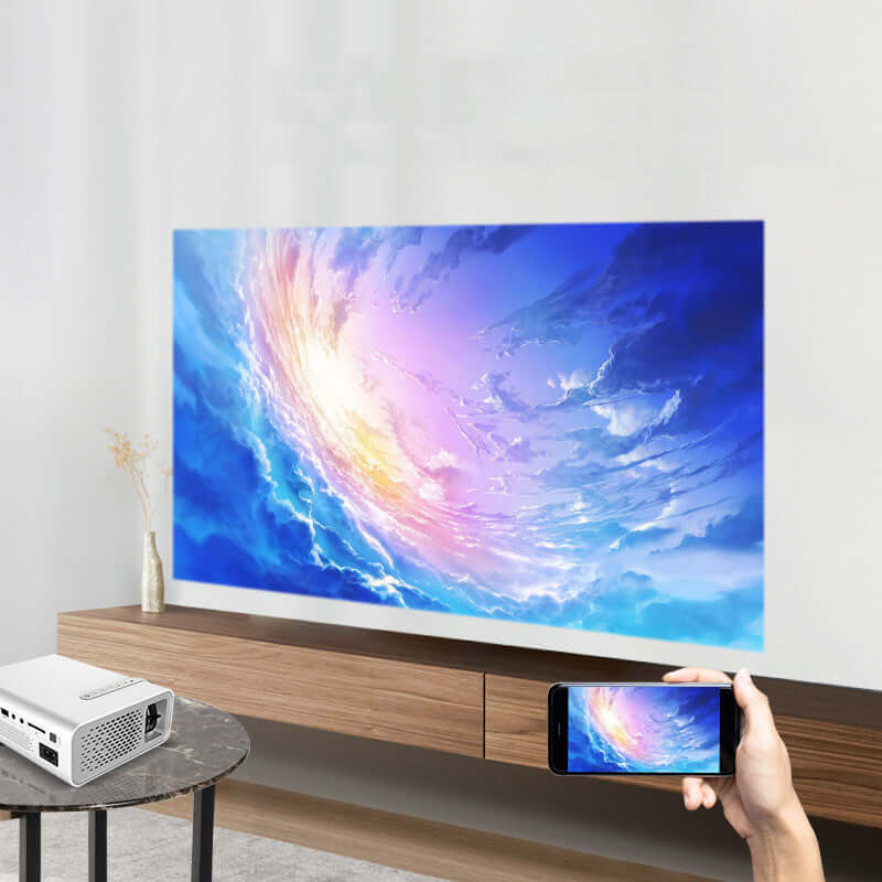 Smartphone displaying a projection of a colorful sky scene onto a wall-mounted screen.