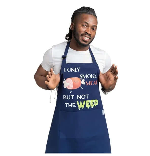 Man wearing a blue apron with humorous text and graphic design on a white background