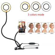 Smartphone with ring light and adjustable stand on a white background
