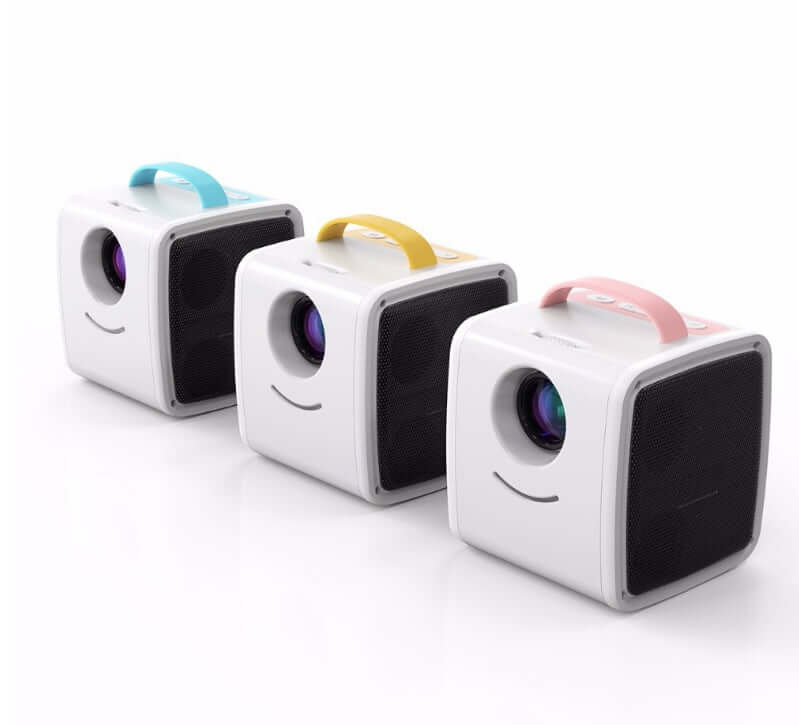 Three small cube-shaped devices with colorful handles on a white background