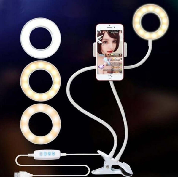 Smartphone with ring light setup on a dark background