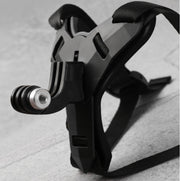 Black archery bow release aid on a textured surface