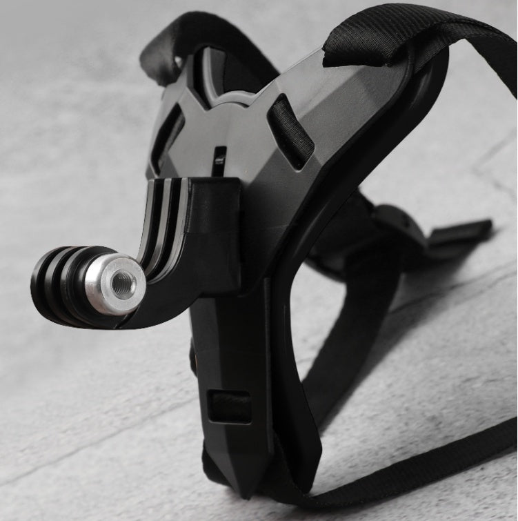 Black archery bow release aid on a textured surface