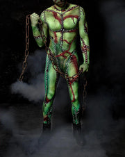 Person in a green and red costume with chains against a dark background