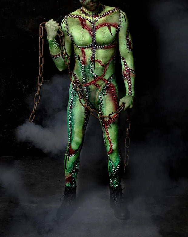 Person in a green and red costume with chains against a dark background