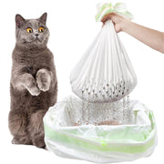 Cat reaching for a white plastic bag filled with cat litter, with a gray cat sitting next to it.
