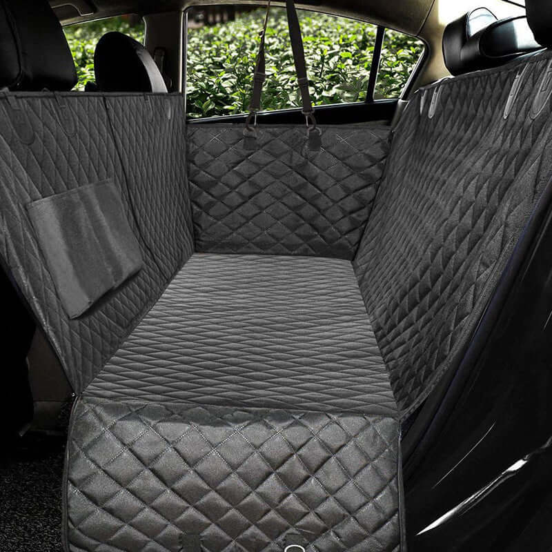 Car interior with quilted gray bench seat cover