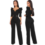 Black jumpsuit worn by a model on a white background