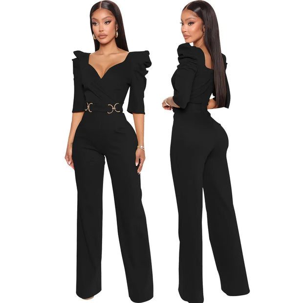 Black jumpsuit worn by a model on a white background
