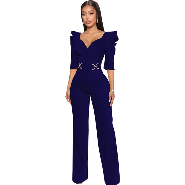 Navy blue jumpsuit with ruffled sleeves on a white background