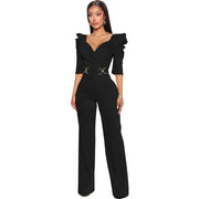 Black jumpsuit with ruffled sleeves and a belt on a white background
