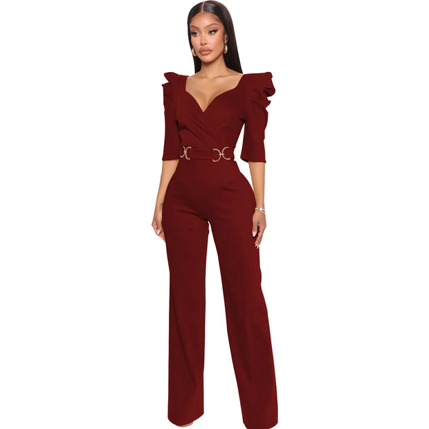 Red jumpsuit with ruffled sleeves on a white background