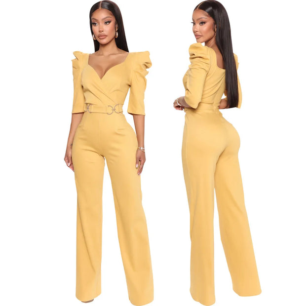 Yellow jumpsuit worn by a model on a white background