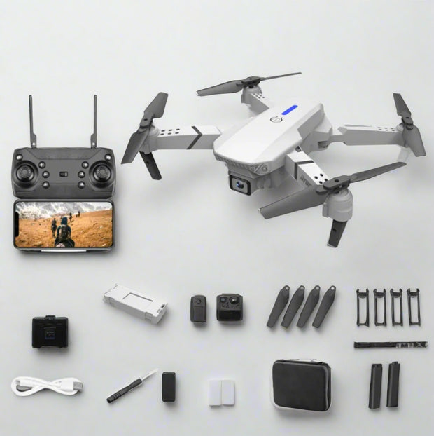 white Drone with remote control, camera, and accessories on a white background