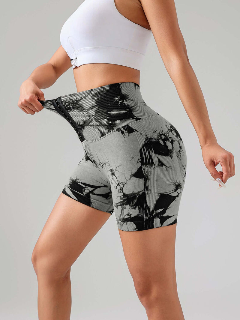 Model showcasing Tie Dye Sports Shorts dye button summer sports shorts, emphasizing stretchy and breathable material for workouts.
