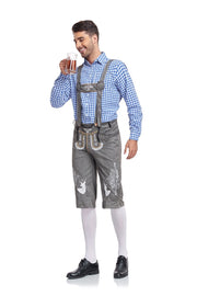 Man wearing traditional Bavarian lederhosen and holding a beer mug on a white background