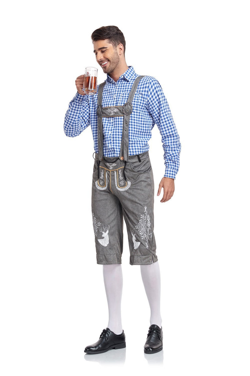 Man wearing traditional Bavarian lederhosen and holding a beer mug on a white background