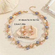 Pearl necklace with measurements on a beige background