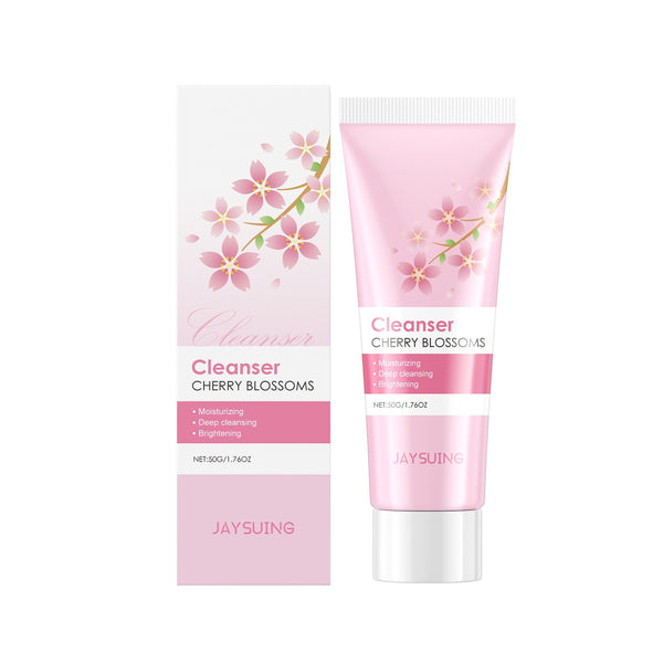 Sakura Luxurious Cleansing Milk with cherry blossoms for deep cleansing and hydration, packaged in a pink tube.