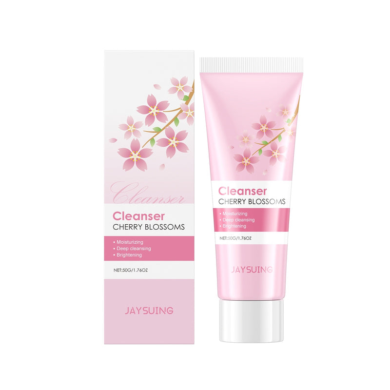 Sakura Luxurious Cleansing Milk with cherry blossoms for deep cleansing and hydration, packaged in a pink tube.
