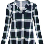 Plaid shirt with green, white, and navy pattern on a white background