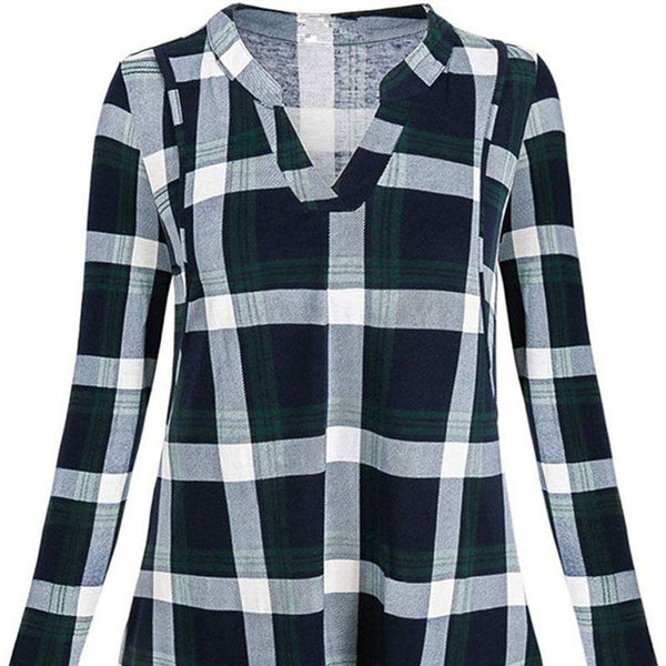 Plaid shirt with green, white, and navy pattern on a white background