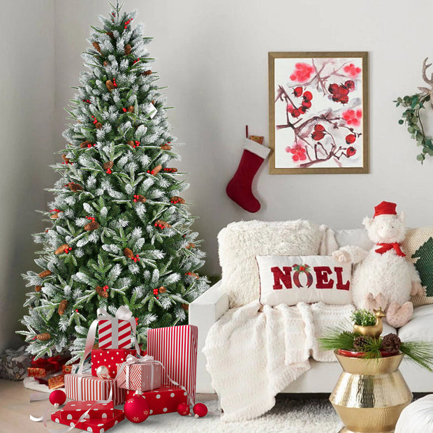 Decorated living room with Christmas tree, stockings, and festive decor.