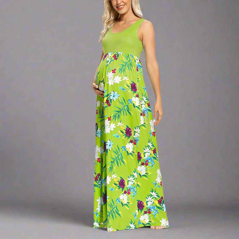 Woman wearing a green floral maxi dress on a white background
